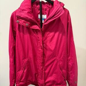 Columbia pink waterproof jacket with hood and pockets. Size L